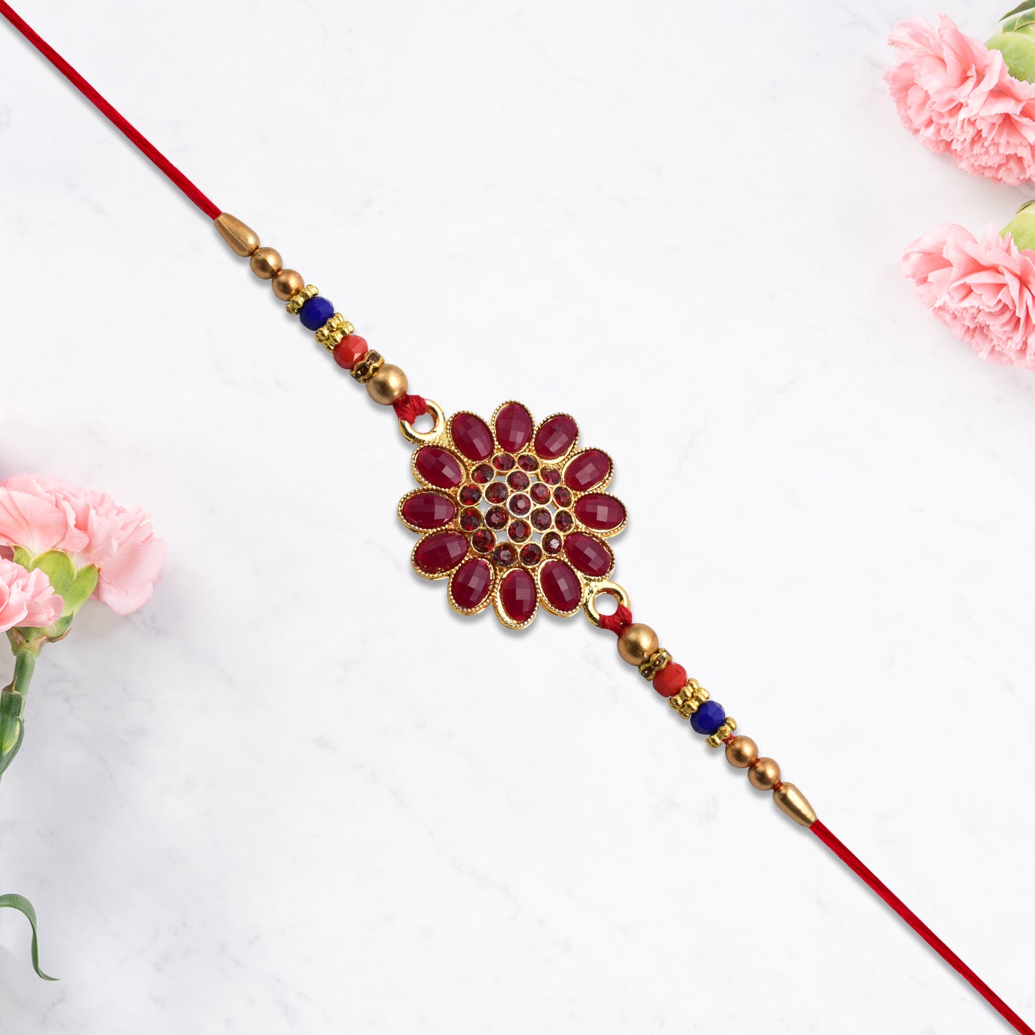 Red Floral Stone Rakhi With Bead Accents Red Floral Stone Rakhi With Bead Accents